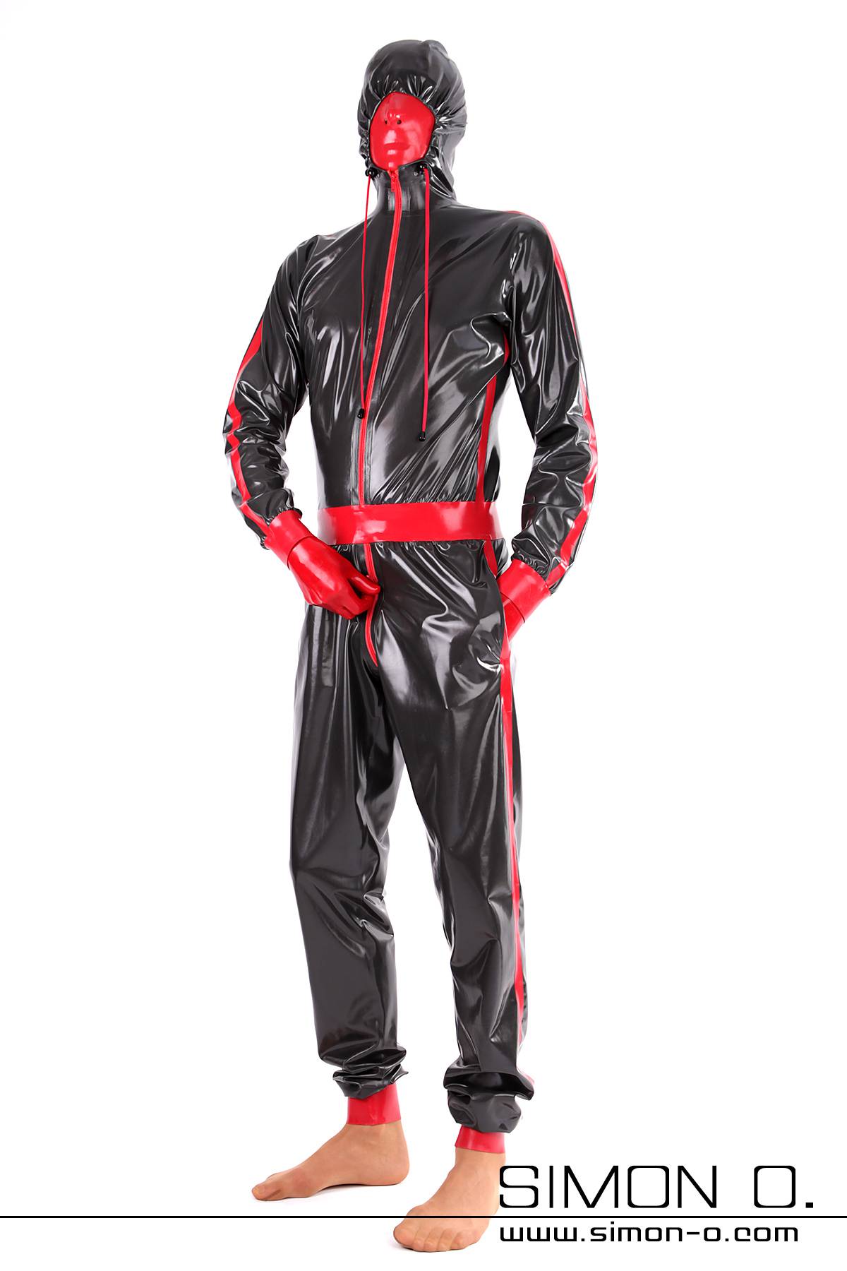Shiny latex suit with hood A gentleman wears a shiny latex suit with a mask