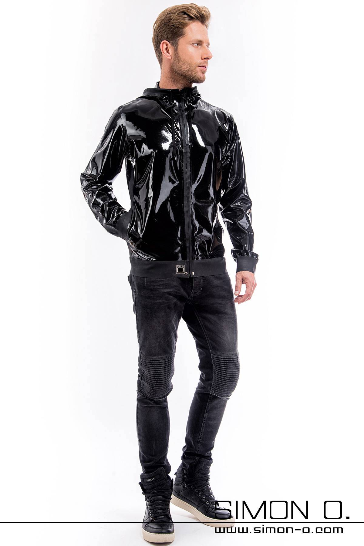 Shiny latex jacket with hood in black A man wears a shiny black latex jacket with hood and pockets in black
