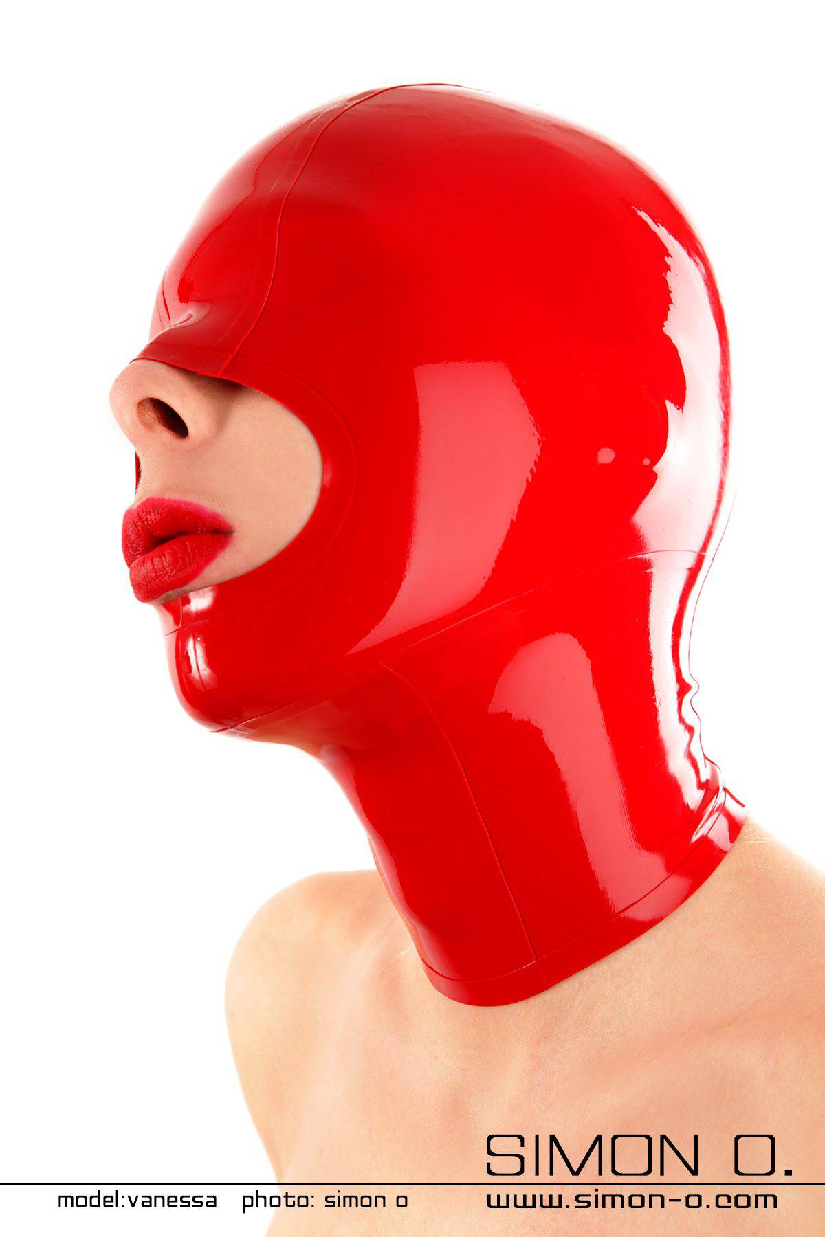 Mouth open latex hood in red A red shiny latex mask with closed eyes and large opening for the mouth