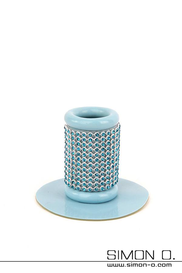 Holder for hairpieces A light blue latex hairpiece holder decorated with Swrovsky rhinestones.