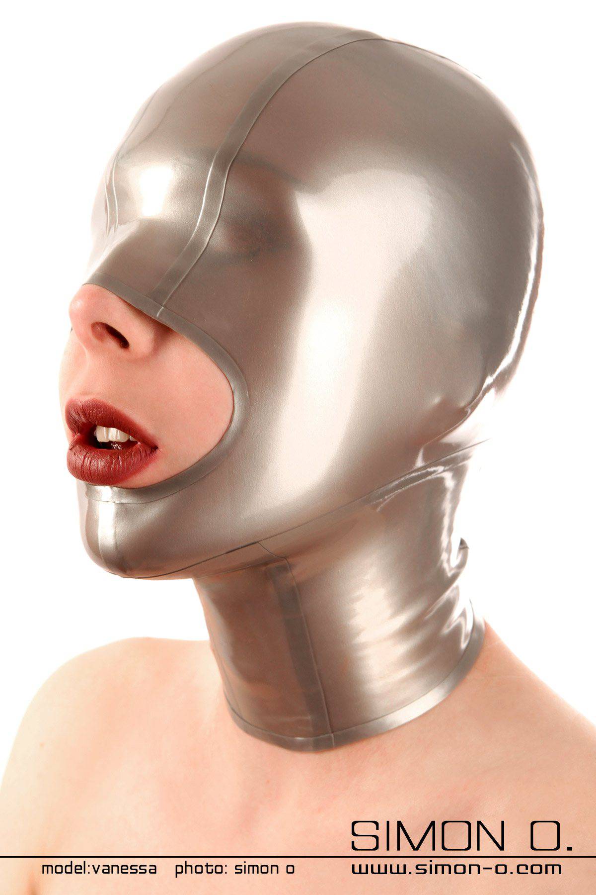 Latex mask with open mouth area. One person wears a silver latex mask with an open mouth area.
