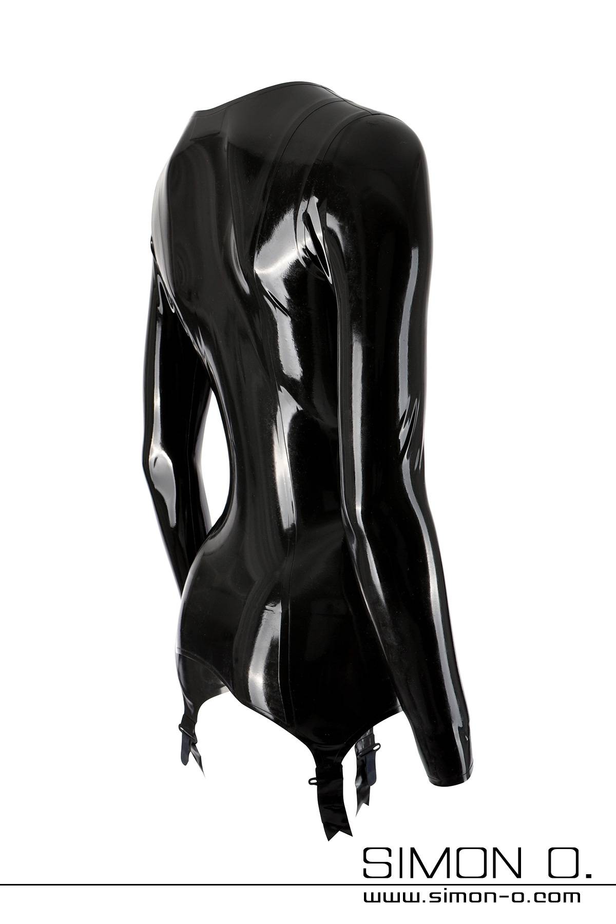 Latex torselette in black Black shiny latex torselette with suspender straps seen from the side.