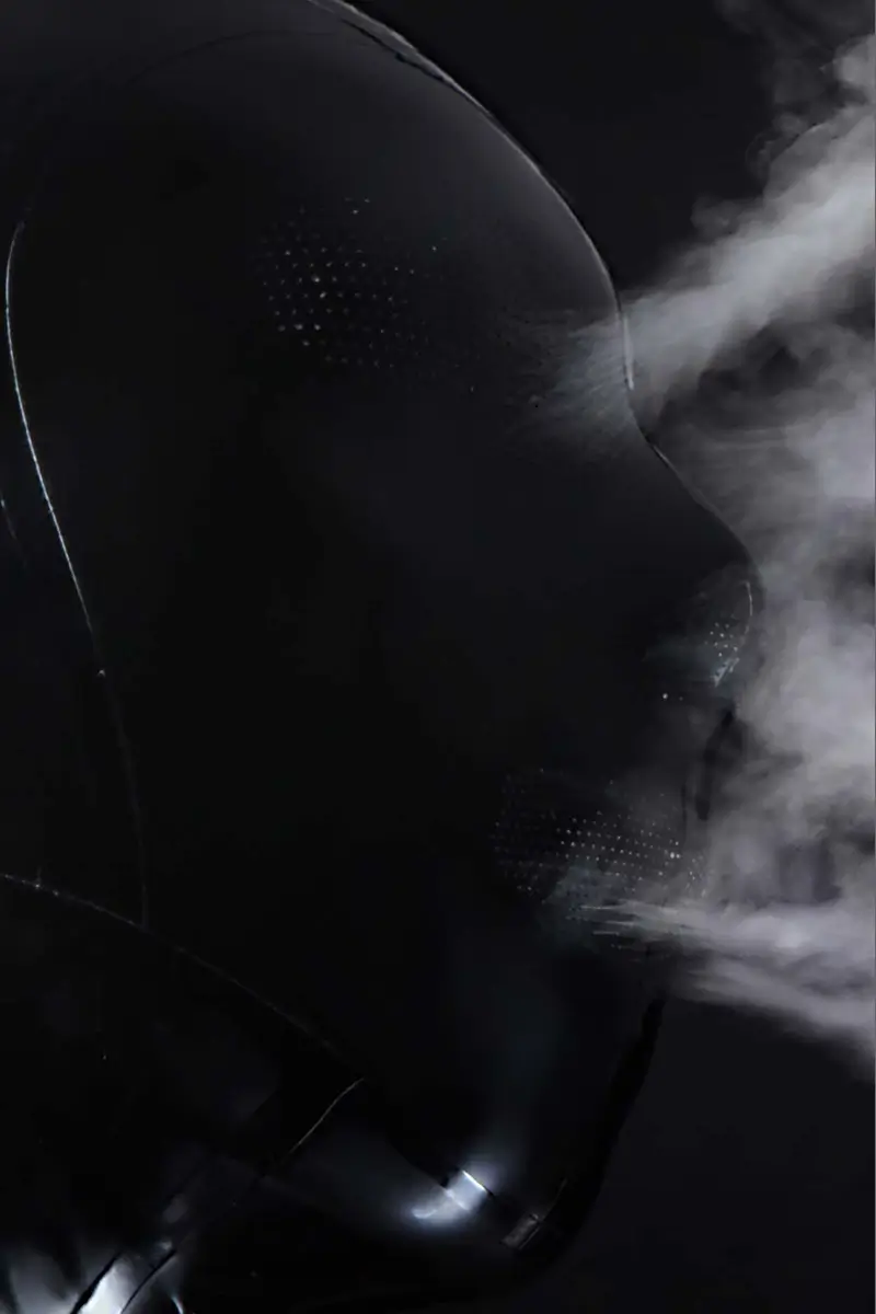 Perforated latex mask closed