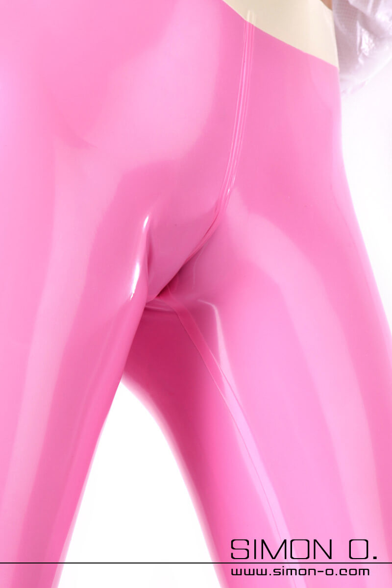 Latex leggings in pink Latex leggings in pink with white. Skin-tight leggings with a white waistband. The seam extends into the crotch area