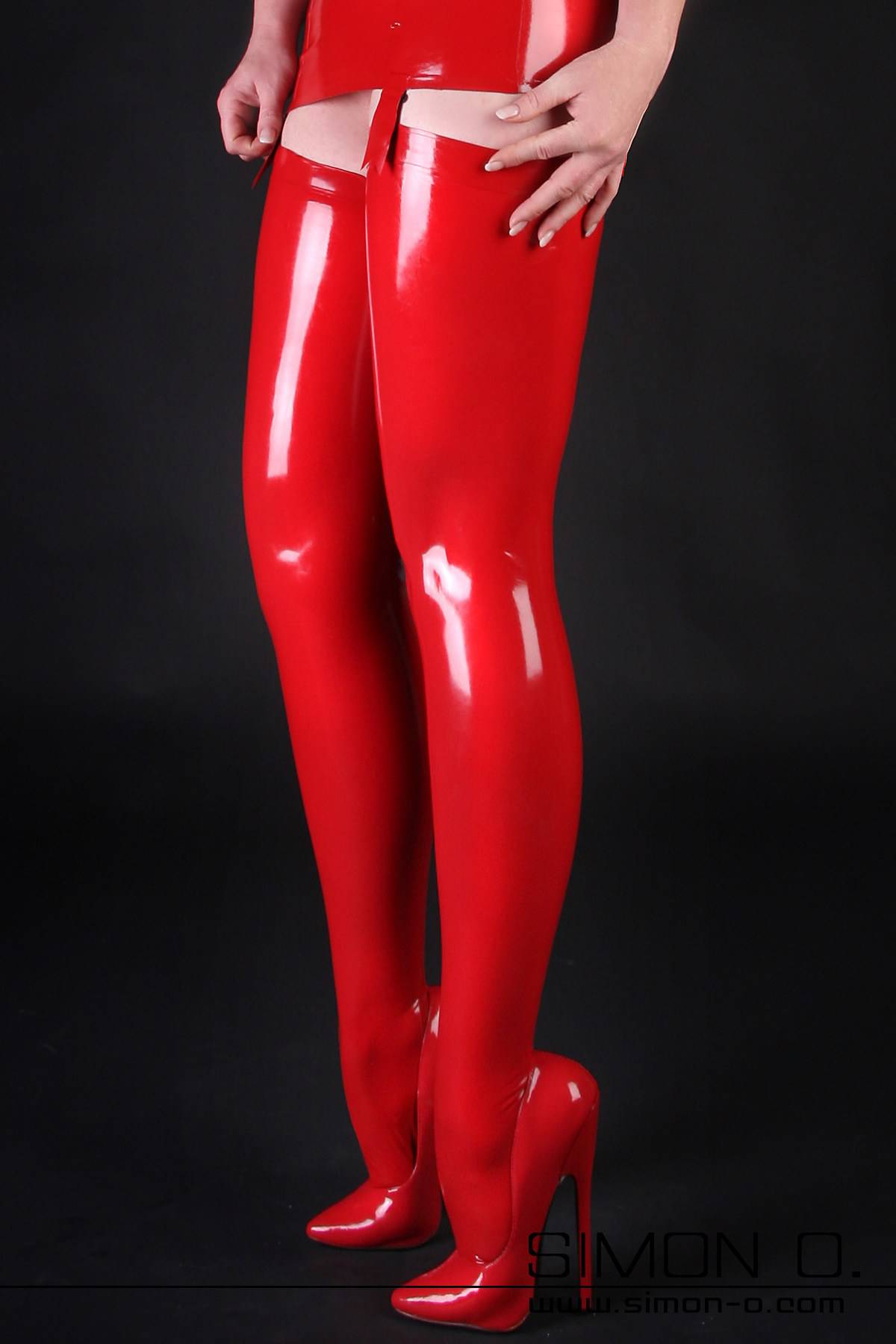 Red latex stockings with suspender straps Red latex stockings with suspender straps