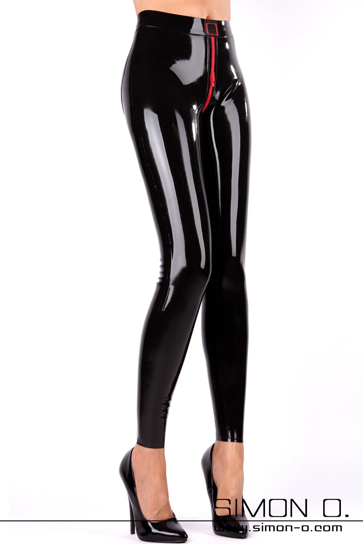 Shiny latex leggings with red zip at the crotch A lady wearing tight, shiny latex leggings and black high heels The leggings have a red zip at the crotch