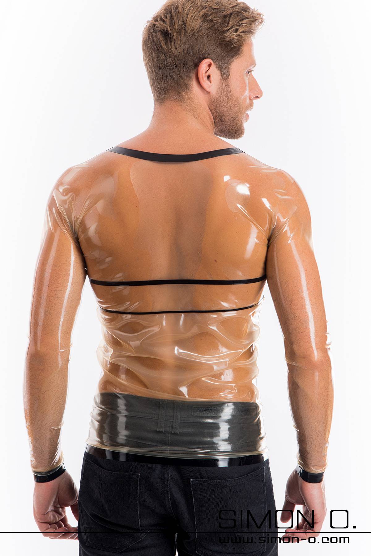Fine Latex Shirt with SIMON O. Logo A man is looking away at a white background and is wearing a transparent latex shirt with long sleeves and black trim on his neck, arms and waist.
