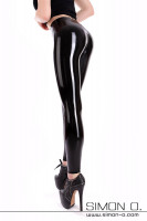 Preview: Legs and bottom with skintight latex leggings in black tight fitting and high-gloss wet look optic of her legs