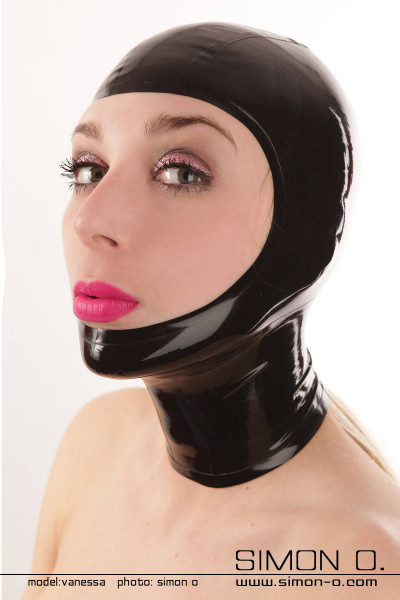 A woman wears a black face open latex hood