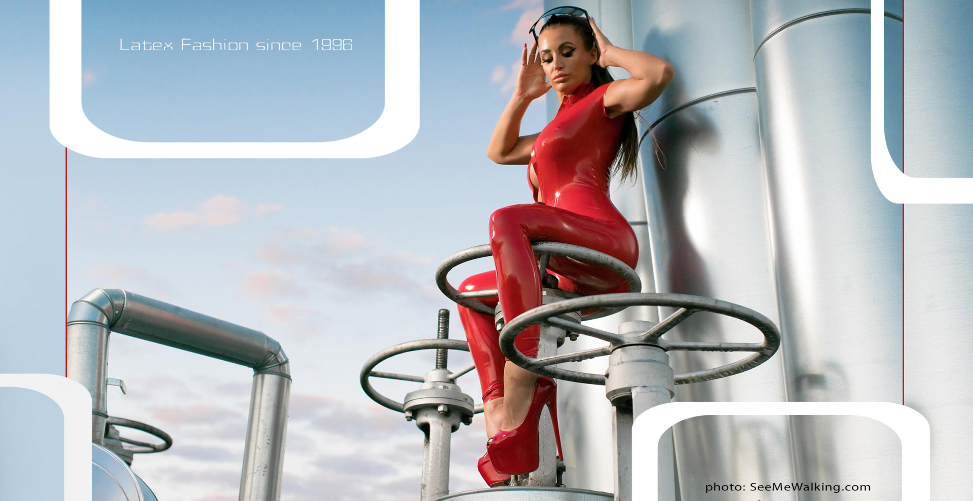 a sitting women wears a skintight shiny red latex catsuit