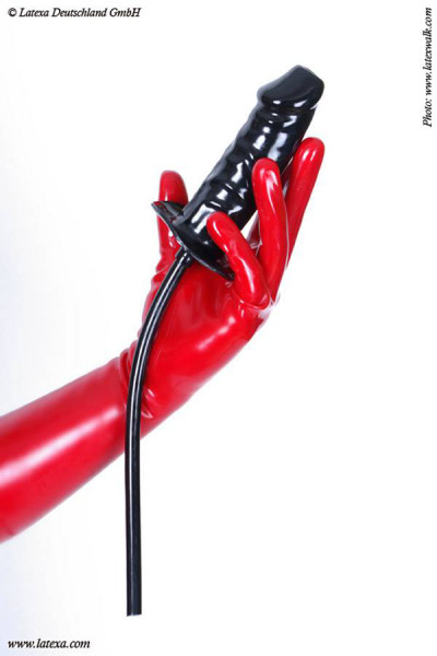 Enema dildo in black with the shape of a limb a tube leads into the inside of the dildo 