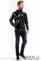 Preview: A man wears a shiny black latex jacket with hood and pockets in black